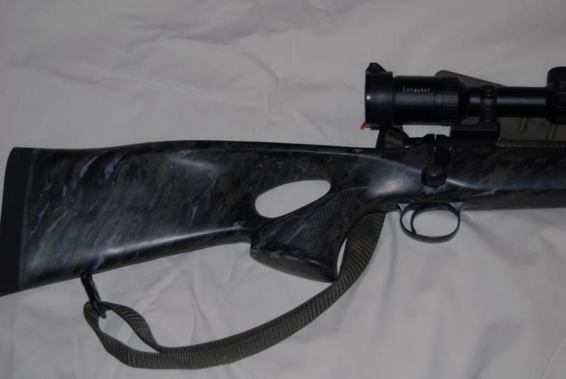 Close-up of marble camo pattern on Rem700 .30-06 with custom McMillan thumbhole stock