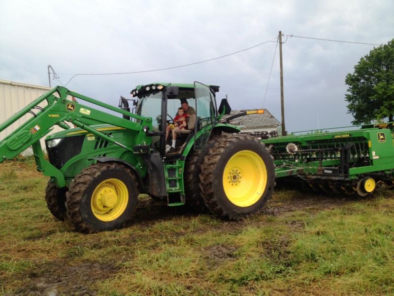 Dad and charlie on the tractor