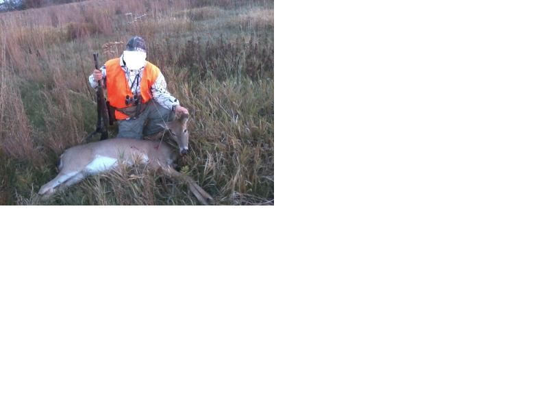 Me with my doe 10/20/2012 Tc Omega Early muzzleloader Iowa