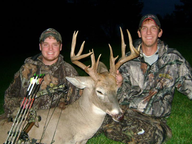 Seth and I with his 2009 159 6/8 17 pointer taken during opening day of Iowa's Archery Season